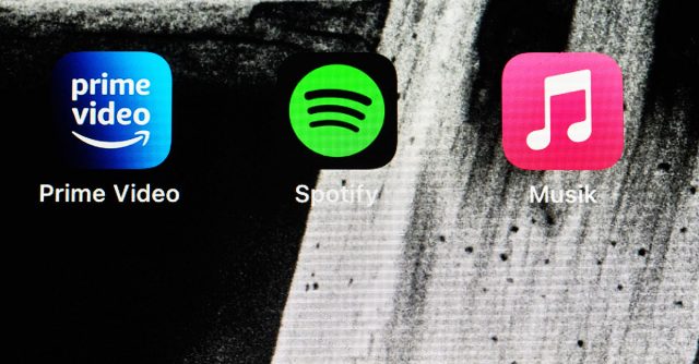 Loghi Apple Music e Spotify 2026